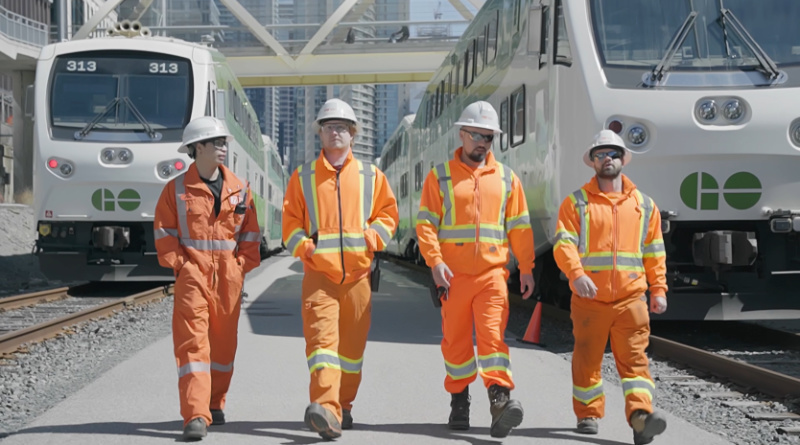 4 TTR workers walking towards the viewer