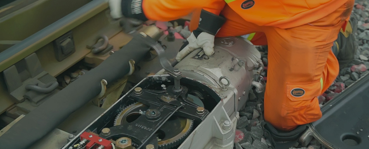 A TTR worker working on fixing the track