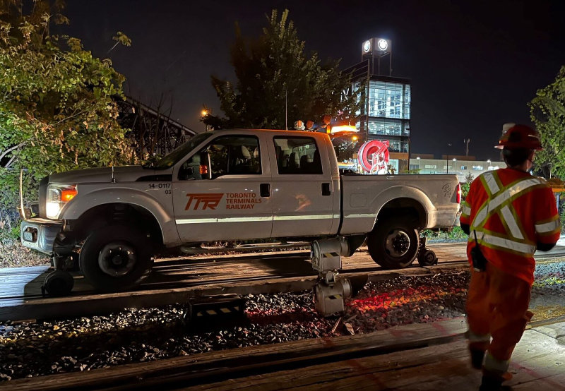 Image at night of TTR Truck on tracks