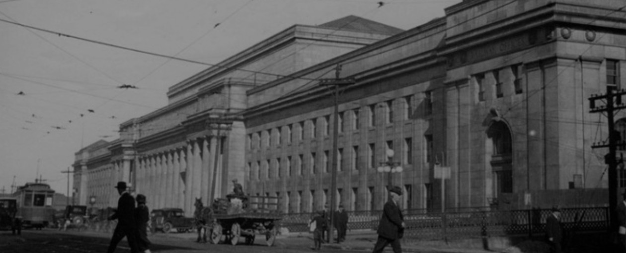 A black and white historical image of Union Station