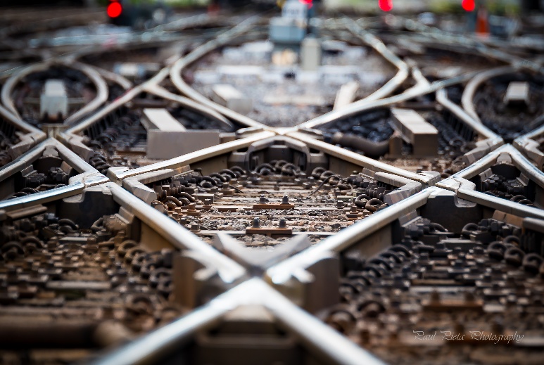 A very close up shot of train tracks