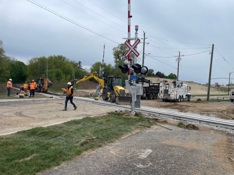 Image of level crossing installation with TTR workers onsite