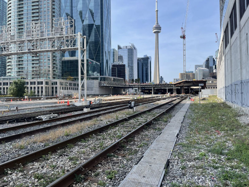 Image of Union Station Rail Corridor from the right side of the tracks looking at a building