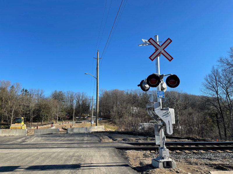 Train signal by railway crossing